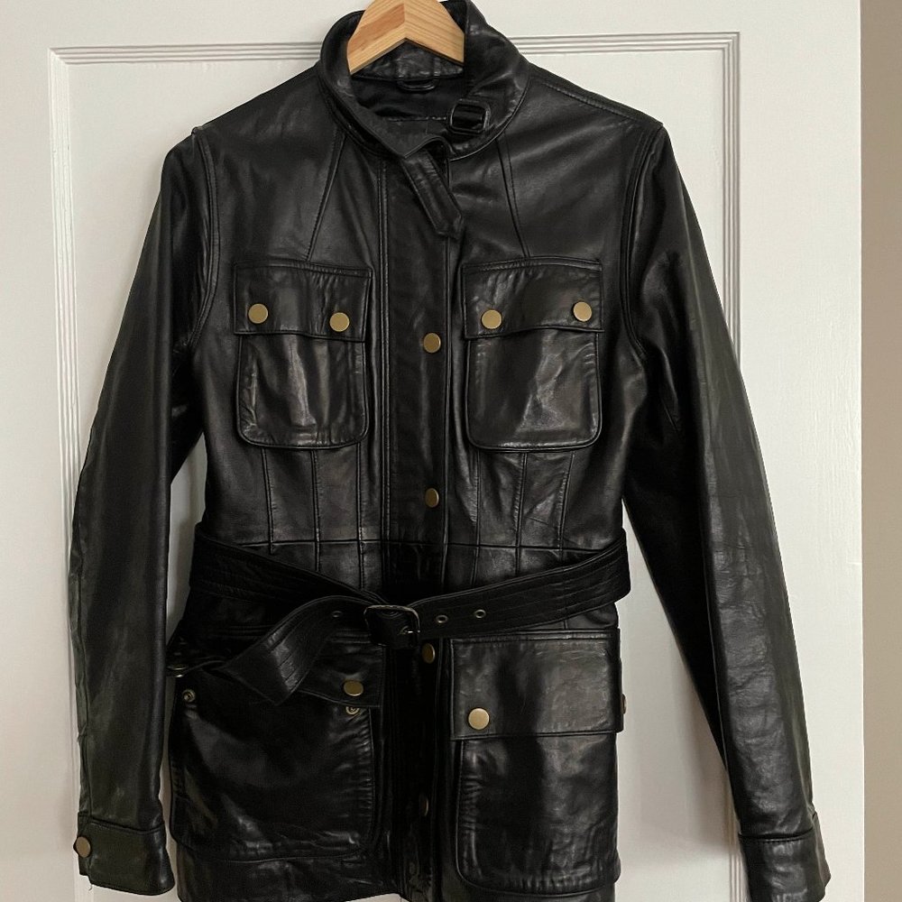 Leather moto-jacket. Brass buckle detail